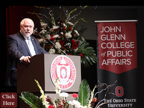 Photo of Ohio Consumers' Counsel Bruce Weston at a podium at the Ohio State University John Glen College of Public Affairs 