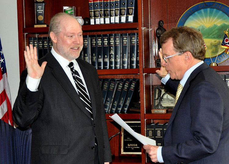 Bruce Weston swearing in with then Attorney General Mike Dewine