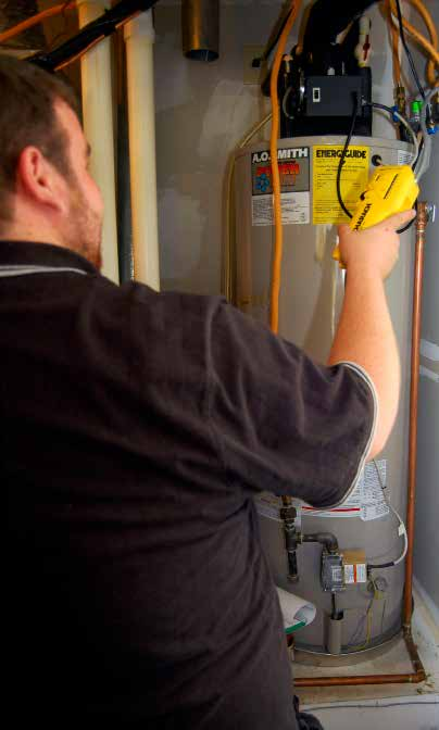 repair person analyzing water heater
