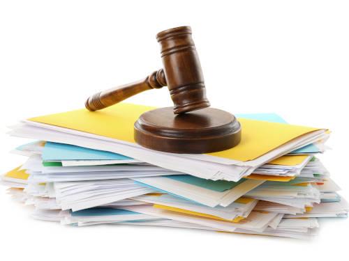 Gavel on a stack of folders